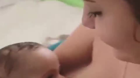 Mother Feeding Baby