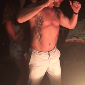 Drunk Shirtless Guy Demands Shirt After Firework Accidentally Pops Near Him