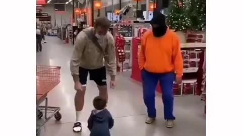 baby dancing in super market