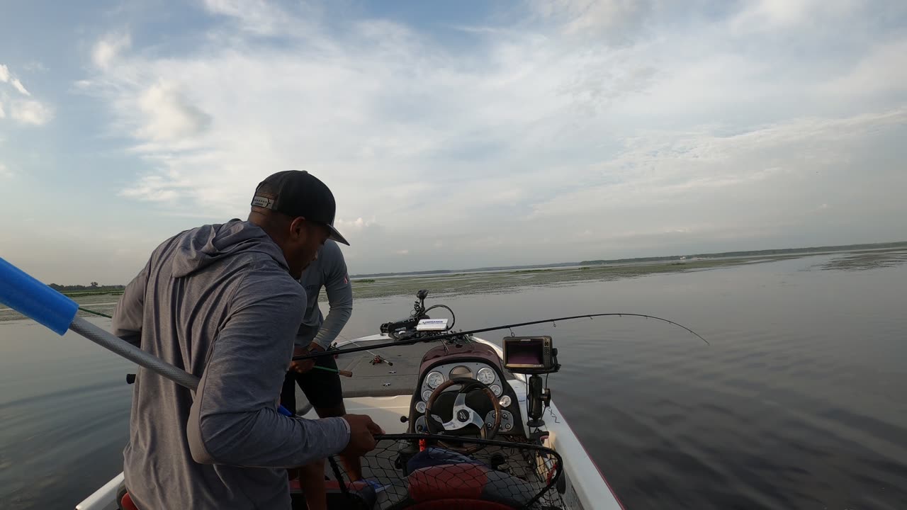 Dad Hypes His Son Up During Fishing Trip