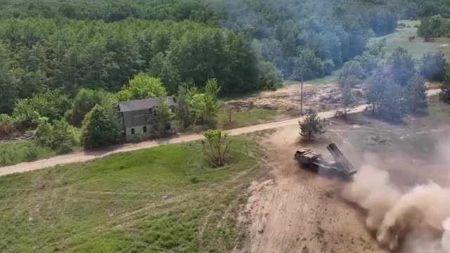 Russian forces deploy self-propelled multiple rocket launcher ‘Uragan’ against camouflaged Ukrainian