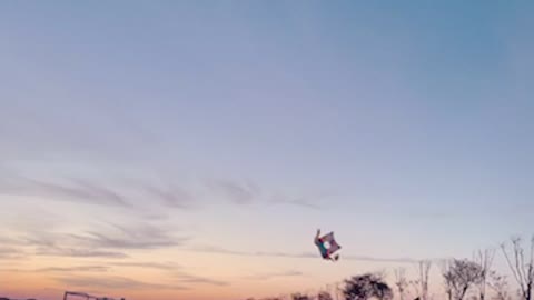 Flying a traditional Korean shield kite.