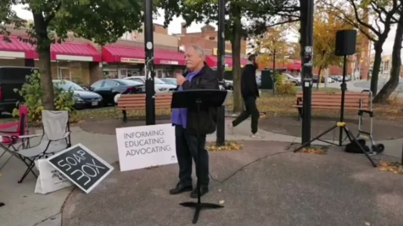 Counter-protester handed the microphone