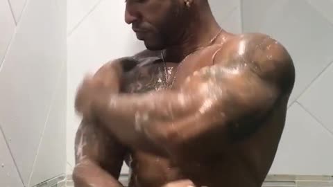 Muscle shower flexing muscle