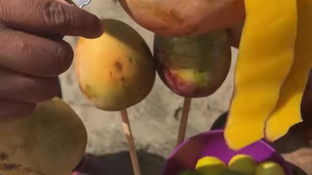 Fresh mangoes on the beach in