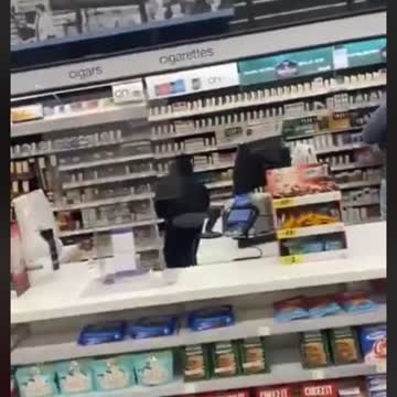 Looters stealing cigarettes from a Chicago Walgreens.