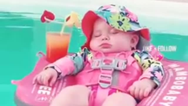 Cute baby lovely sleeping moment on the water