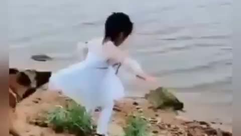 DOG SAVES YOUNG GIRL