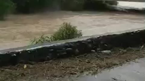 River is cresting tropical storm Kompasu in the Philippines