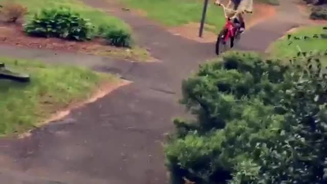 Guy rides bike with no breaks runs into fence