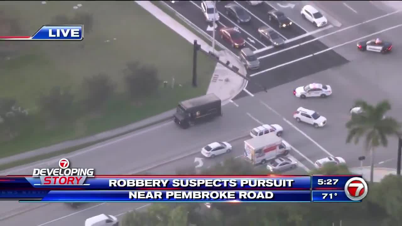 Armed Robbers Carjack UPS Truck & Lead Police on a Chase which Ends In Gunfire...