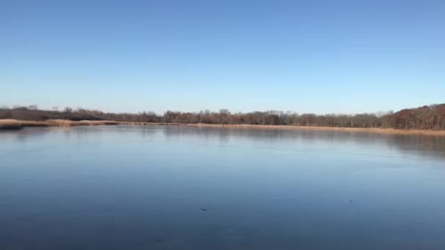 Skipping Rocks on Frozen Lake Wisconsin