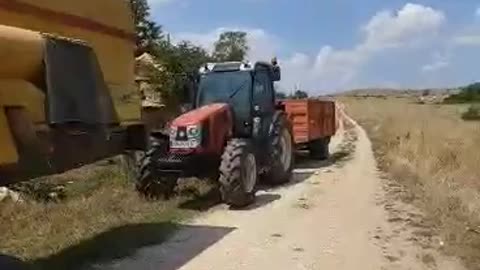 New Holland Combine and Hattat Tractor