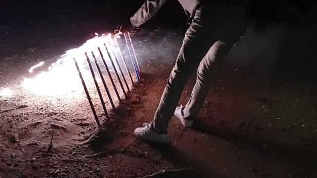 Play fireworks at the seaside.