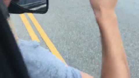 Music guy grey shirt throws up from car