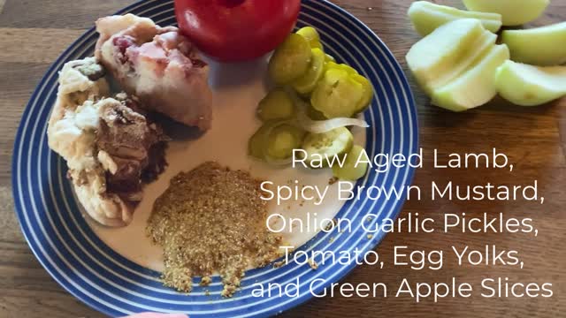 Raw Aged Lamb Spicy Brown Mustard Onion Garlic Pickles Tomato Egg Yolks and Green Apple Slices