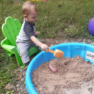 Playing Outside in Sandbox