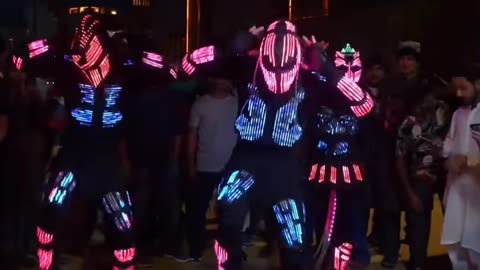 Dancing glowing aliens