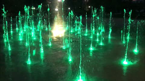 Colorful dancing fountain at Araucano park in Santiago, Chile