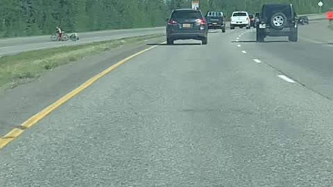 Alaskan Motorists Use Caution When Following an Erratic Driver on Freeway