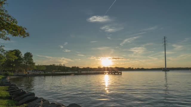 Simply Beautiful Time Lapse of t Video of the Sunset by a River.