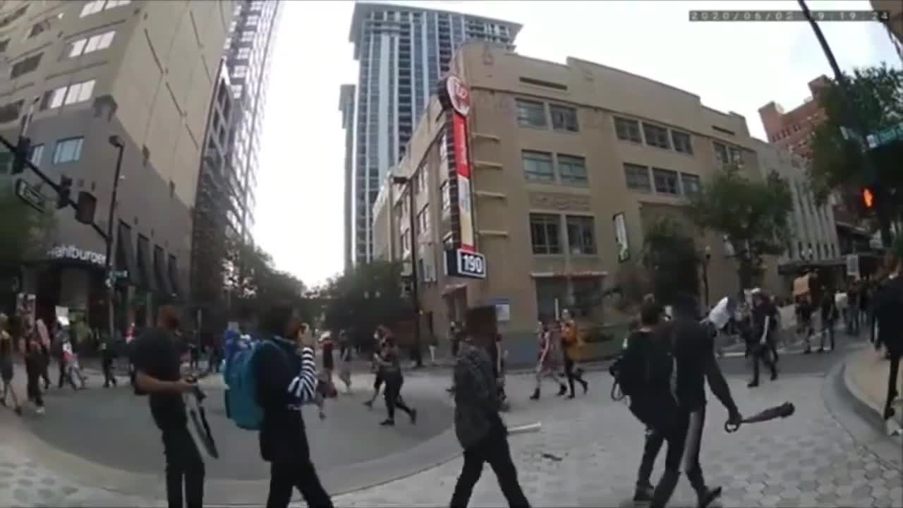 Body Cam: Protester Arrested For Stabbing People with Syringe