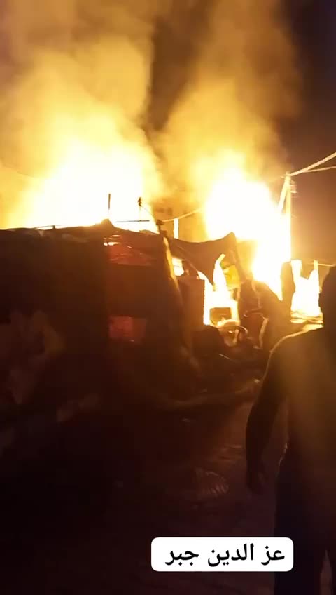 Bombing tents for displaced people on Al-Sikka Street in Al-Bureij camp in the central Gaza Strip