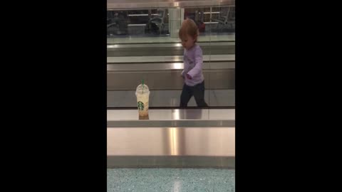 Toddler Walks Wrong Way On Moving Sidewalk