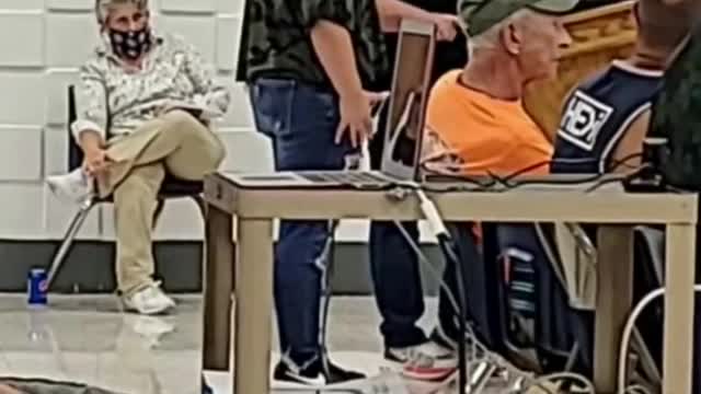Certified Medical Assistant demonstrates reduced breath-ability of masks
