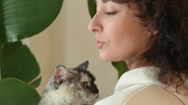 Woman Holding a Cat