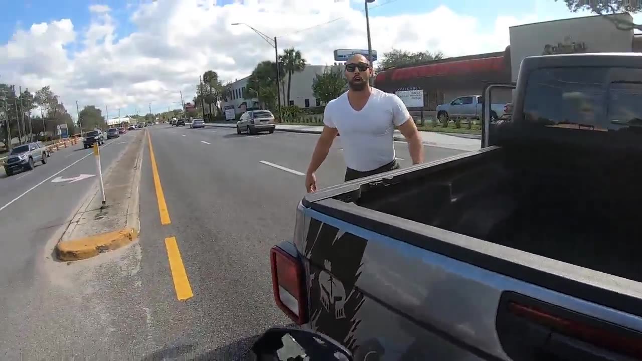 Truck Driver Blocks Road