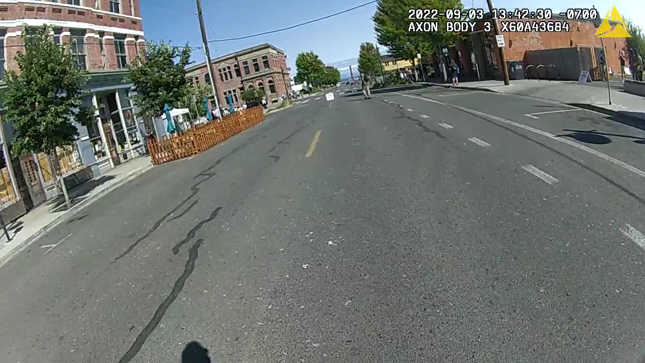 Black Umbrella Looks Suspicious, Officer Cam take Umbrella to Vehicle