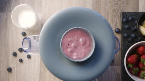 Overhead Blended Strawberry Smoothie in Blender