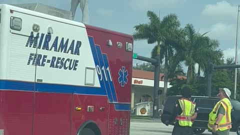 Dancer On Top Of An Ambulance