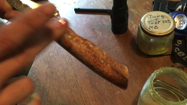 Hand Forged Knife, First coat of oil on the Maple burl handle.