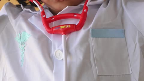 a-little-girl-playing-as-a-doctor