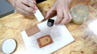 Nail The Button And The Leather Cloth Together