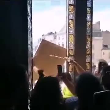 A Portrait Of Emmanuel Macron Was Trampled Before Being Torn And Then Thrown Out The Window