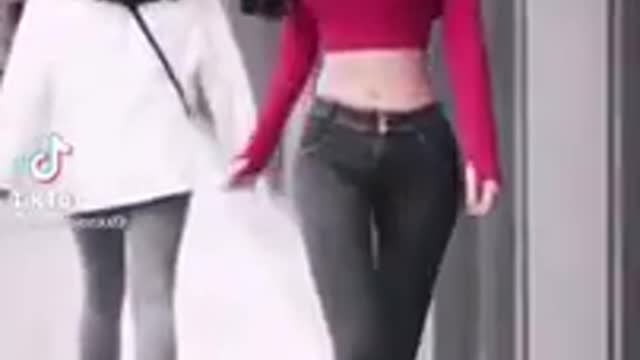 Skinny girl walking sideways virl tik tok video trend