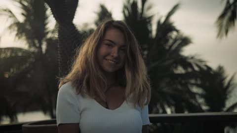 Woman standing on an outdoor deck