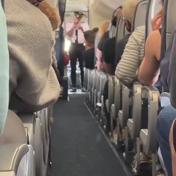 A Delta Airlines flight attendant cried as she took off her mask for the first time in two years.