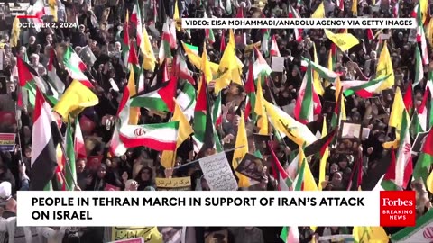 People In Tehran March In Support Of Hezbollah And Iran's Missile Attack On Israel