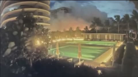 Suspicious flashes before condos fall