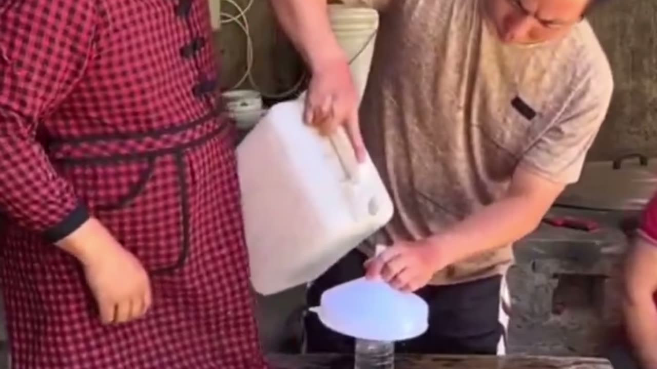 Funnel Fiasco: A Comical Attempt at Pouring Water