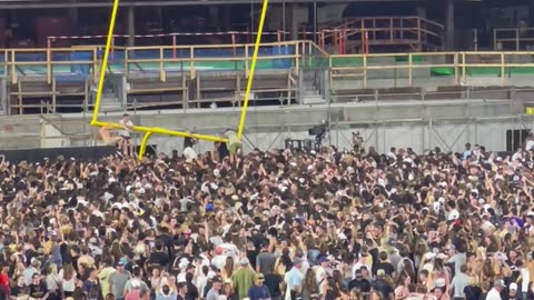 Crowd Dismantles Goal Post After College Football Game