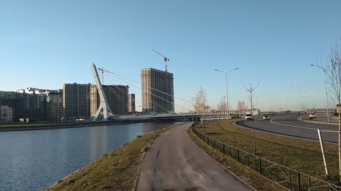 Panorama of the river and the new district in Sunny autumn