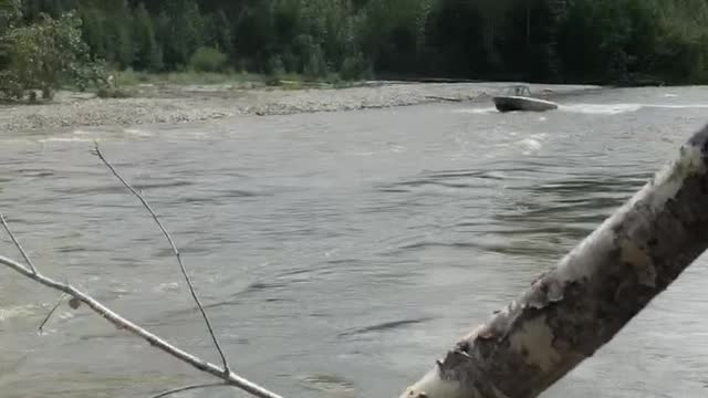 Boat Jumps River Blockage