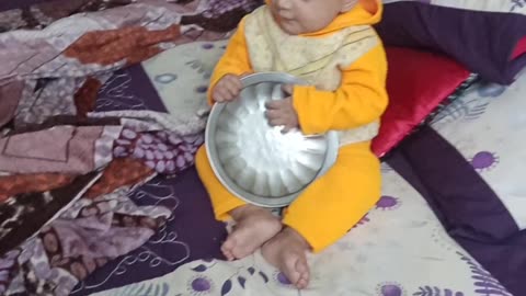 Beautiful baby enjoy cartoon video