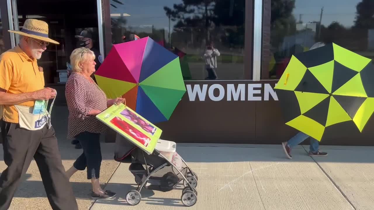 Two Abortion Escorts Harassing Pro-Life Witnesses