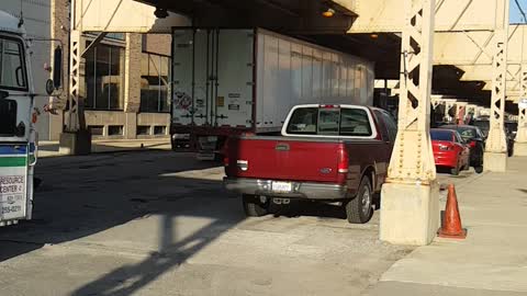 Semi Driver Tries to Pass Under Low Clearance Bridge, Fails